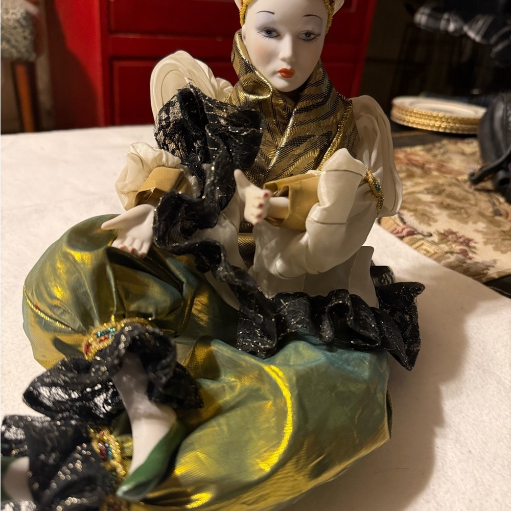 Porcelain Clown Doll in Green and Black Costume